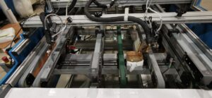 Lunex 1600 hot melt gluer with working station